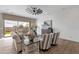 Comfortable living room with lots of seating, accent furniture and a view to the backyard at 1145 E Gleneagle Dr, Chandler, AZ 85249