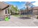 The backyard area features a trampoline and other outdoor play items at 1161 N Cole Dr, Gilbert, AZ 85234