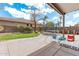 Spacious backyard features a covered patio, trampoline and well-maintained lawn at 1161 N Cole Dr, Gilbert, AZ 85234