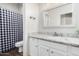 Bathroom featuring a vanity with granite countertop and tiled floors at 1161 N Cole Dr, Gilbert, AZ 85234