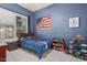 Blue bedroom with a bed and fun decor, perfect for a  at 1161 N Cole Dr, Gilbert, AZ 85234