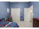 Bedroom with closet and attached bathroom, ideal for easy living at 1161 N Cole Dr, Gilbert, AZ 85234