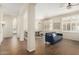 Open-concept living and dining areas featuring wood floors and abundant natural light at 1161 N Cole Dr, Gilbert, AZ 85234