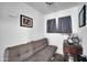 Bedroom featuring a sofa and a window at 12022 W Belmont W Dr, Avondale, AZ 85323