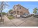 Two-story home with extended driveway, covered porch, and attached garage, perfect for families at 12022 W Belmont W Dr, Avondale, AZ 85323