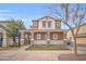 Charming two-story home with a covered porch and well-manicured lawn for curb appeal at 12022 W Belmont W Dr, Avondale, AZ 85323