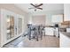 Bright kitchen nook with a table, tile flooring, and lots of natural light at 12022 W Belmont W Dr, Avondale, AZ 85323