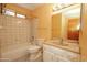 Bathroom featuring a shower-tub combo and a single sink vanity at 13012 N 26Th Dr, Phoenix, AZ 85029