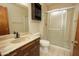 Bathroom features a vanity with a sink, a toilet, and a shower stall at 13012 N 26Th Dr, Phoenix, AZ 85029