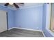 Comfortable bedroom features a ceiling fan and window at 13012 N 26Th Dr, Phoenix, AZ 85029