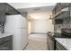Open concept kitchen with stainless appliances, granite countertops, and modern backsplash at 13012 N 26Th Dr, Phoenix, AZ 85029