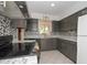 The kitchen features granite countertops, ample cabinetry, and stainless steel appliances at 13012 N 26Th Dr, Phoenix, AZ 85029