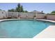 Backyard view featuring an in-ground pool and block wall fencing at 13012 N 26Th Dr, Phoenix, AZ 85029