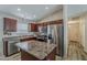Open kitchen featuring stainless steel appliances and granite countertops at 1396 E Leslie Ave, San Tan Valley, AZ 85140