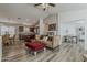 Open-concept living space showcasing the kitchen, living, and dining areas with stylish finishes at 1396 E Leslie Ave, San Tan Valley, AZ 85140