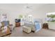 Bright bedroom with a ceiling fan and white accents at 1420 W Raven Dr, Chandler, AZ 85286