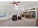 An open concept living room is next to the kitchen at 1420 W Raven Dr, Chandler, AZ 85286