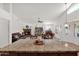An open concept kitchen island flows into the living room at 1420 W Raven Dr, Chandler, AZ 85286