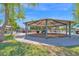 Community playground featuring swings and climbing structures with seating at 1420 W Raven Dr, Chandler, AZ 85286