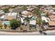 Aerial view of home with pool, RV and boat parking, and block fencing at 1670 E Whitten St, Chandler, AZ 85225