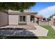 Welcoming front entrance featuring stone accents and manicured landscaping at 1670 E Whitten St, Chandler, AZ 85225