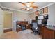 Functional home office featuring built-in shelves and desk area at 1670 E Whitten St, Chandler, AZ 85225