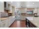 This modern kitchen boasts stainless steel appliances, including a gas cooktop, and great counter space at 1670 E Whitten St, Chandler, AZ 85225