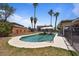 Inviting pool with ample deck space, surrounded by lush landscaping for ultimate relaxation at 1670 E Whitten St, Chandler, AZ 85225