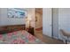 Stylish bedroom featuring a wood-frame bed and decor for a modern and comfortable ambiance at 17219 W La Luz Rd, Surprise, AZ 85387