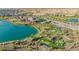 Aerial view of the community putt-putt and lake, showcasing the beautiful grounds at 17219 W La Luz Rd, Surprise, AZ 85387