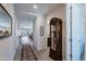 Bright hallway offers an open layout with tile floors and leads to the living spaces at 17219 W La Luz Rd, Surprise, AZ 85387