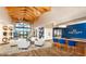 Spacious lobby with ample seating, wood floors, and blue accent walls at 17219 W La Luz Rd, Surprise, AZ 85387