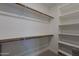 Spacious walk-in closet with shelving and rod for optimal organization at 17219 W La Luz Rd, Surprise, AZ 85387