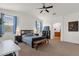 Bedroom with ceiling fan, and a view to the bathroom at 1725 E Chanute Pass --, Phoenix, AZ 85040