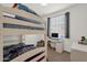' bedroom with bunk beds, study desk, and window for natural light at 1725 E Chanute Pass --, Phoenix, AZ 85040