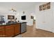 Modern kitchen with stainless steel dishwasher and appliances, overlooking the dining area at 1725 E Chanute Pass --, Phoenix, AZ 85040