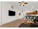 Open concept living room and kitchen with stainless steel appliances and bar seating at 1725 E Chanute Pass --, Phoenix, AZ 85040
