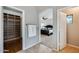 View of the main bedroom, showing neutral decor, an ensuite bathroom, and a walk-in closet at 17562 W Agave Ct, Goodyear, AZ 85338