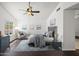 Main bedroom featuring neutral decor, sitting area, and ample natural light at 18031 N 12Th Pl, Phoenix, AZ 85022