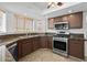 Kitchen with stainless steel appliances and granite countertops at 18031 N 12Th Pl, Phoenix, AZ 85022