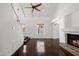Spacious living room with high ceilings, hardwood floors, and fireplace at 18031 N 12Th Pl, Phoenix, AZ 85022
