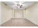Spacious bedroom with a neutral color palette, carpet, and ceiling fan at 18309 N Crestview Ln, Maricopa, AZ 85138