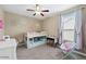 bedroom featuring a bunk bed, ceiling fan, and neutral wall color at 18309 N Crestview Ln, Maricopa, AZ 85138