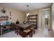 Dining room area features a square table with stools and a hutch at 18309 N Crestview Ln, Maricopa, AZ 85138