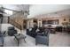 Living room shows high ceilings, staircase and open layout to kitchen at 18309 N Crestview Ln, Maricopa, AZ 85138