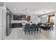 Modern kitchen with stainless steel appliances, a center island, and sleek countertops at 18649 W Williams St, Goodyear, AZ 85338
