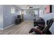 Inviting living room with a comfortable couch, TV, and plenty of natural light at 18649 W Williams St, Goodyear, AZ 85338
