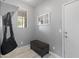Cozy mudroom featuring a storage bench and hooks for organization and convenience at 18649 W Williams St, Goodyear, AZ 85338