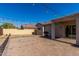 Large backyard featuring a covered patio, grill, paved area, fire pit and string lights at 19342 W Morning Glory Dr, Buckeye, AZ 85326