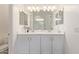 Bright bathroom with double vanity featuring modern fixtures and ample counter space at 1951 W Plum Rd, Phoenix, AZ 85085